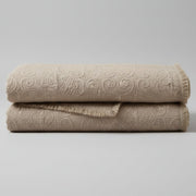 DaDa Bedding Elegant Fringed Cotton Quilted Throw Blanket - Luxurious Solid Soft Paisley Pattern, Cozy Lightweight Lap Throw, Perfect for Couch or Bed, Neutral Sandy Taupe Tan Beige, 50x60 Inches
